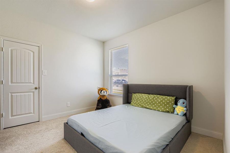 Bedroom with light colored carpet Bedroom with light colored carpet