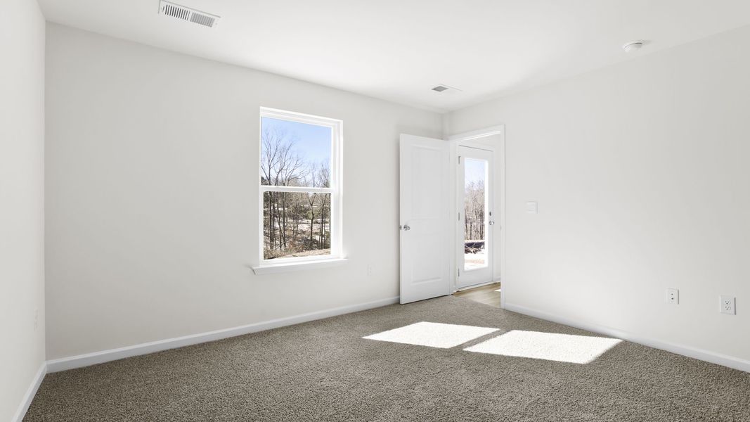 Spacious, unfurnished interior of a new home in Village Grove, Greenville (Image 27).