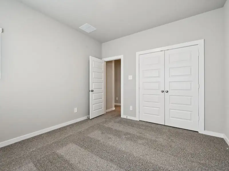 Spacious, unfurnished interior of a new home in Bridge Creek Village - City Series, Cypress (Image 25). Spacious, unfurnished interior of a new home in Bridge Creek Village - City Series, Cypress (Image 25).