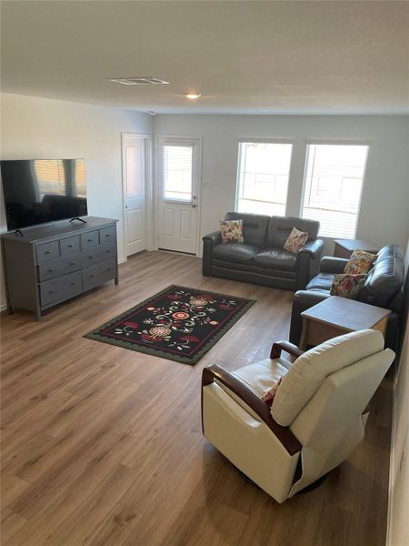 Living room featuring light wood finished floors