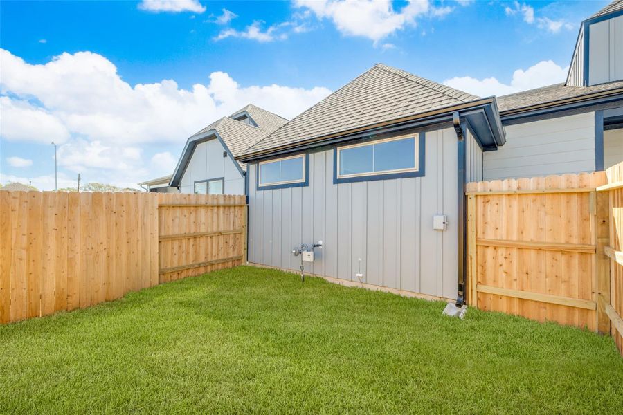 Exterior details and patio area of a home in , Sealy (Image 3).