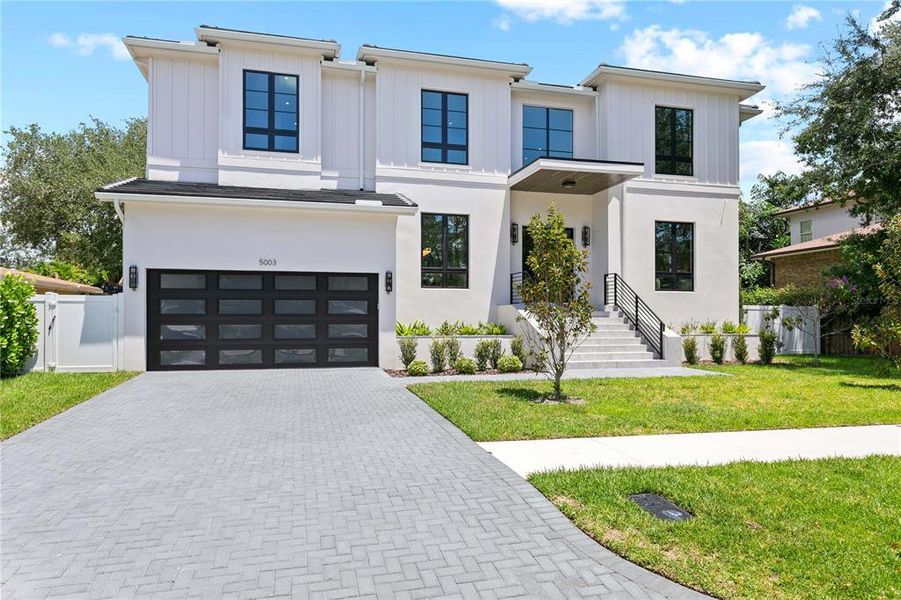 Front exterior of a new home in , Tampa, FL, highlighting curb appeal (Image 2). Front exterior of a new home in , Tampa, FL, highlighting curb appeal (Image 2).