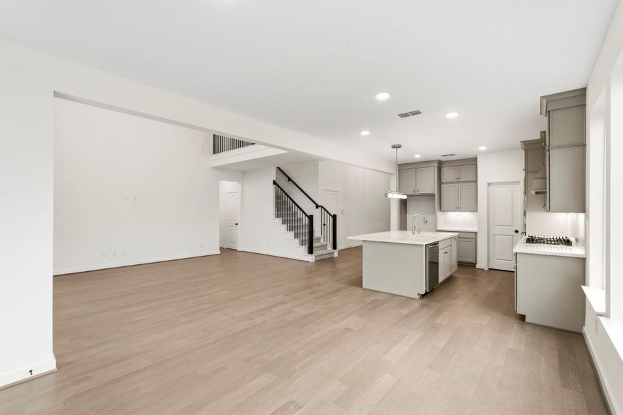 **RENDERING PHOTO OF THE SAME FLOOR PLAN, FINISHES WILL VARY** **RENDERING PHOTO OF THE SAME FLOOR PLAN, FINISHES WILL VARY**