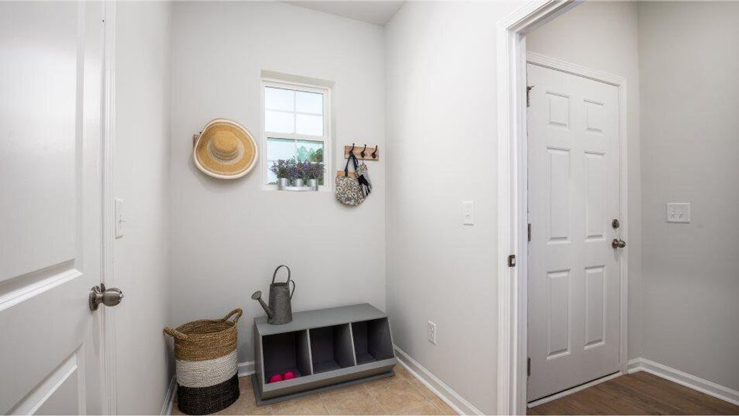 Furnished interior view inside a new home in Lindera Preserve at Cane Bay Plantation: American Dream Series - Ph 15, Summerville (Image 4). Furnished interior view inside a new home in Lindera Preserve at Cane Bay Plantation: American Dream Series - Ph 15, Summerville (Image 4).