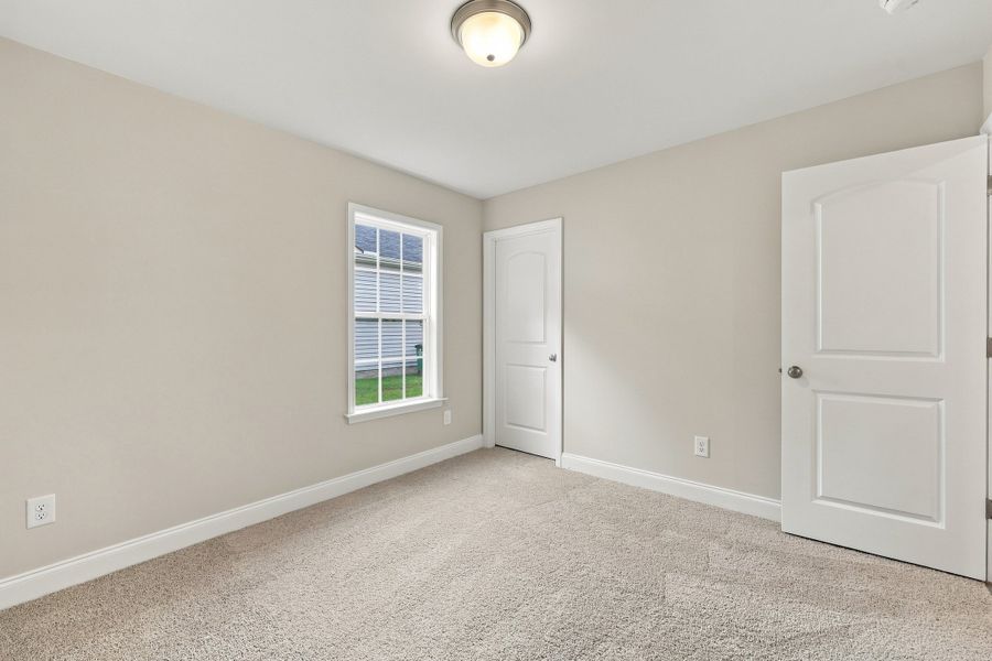 Spacious, unfurnished interior of a new home in Davenport Farms, Winterville (Image 31).