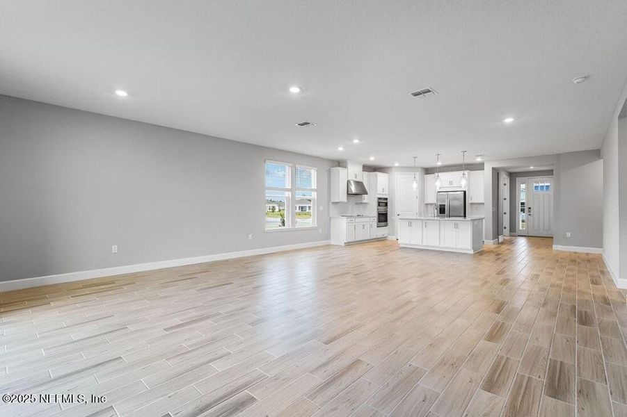 Spacious, unfurnished interior of a new home in Colbert Landings, Palm Coast (Image 27).