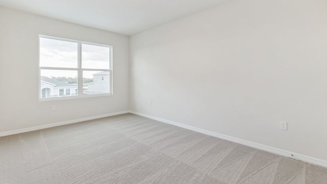 Representative unfurnished interior of a home built from the Jordyn II by D.R. Horton in Coddington, Bradenton (Image 15).