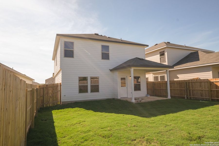 Exterior details and patio area of a home in Winding Brook, San Antonio (Image 16).