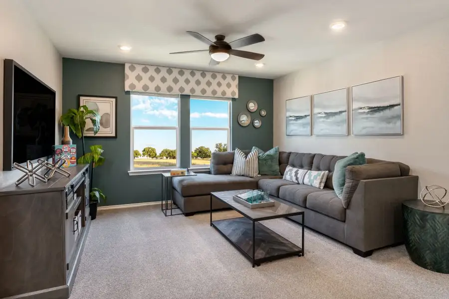 Representative furnished interior of a home built from the 2070 by KB Home in Creekside at Estancia, Austin (Image 7).