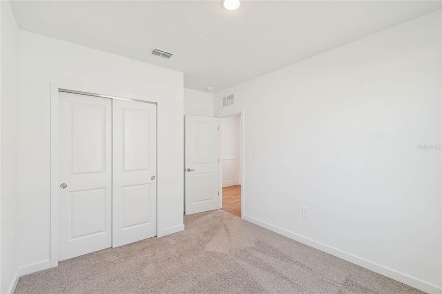 Spacious, unfurnished interior of a new home in Aspire at Canter Creek, Davenport (Image 23).