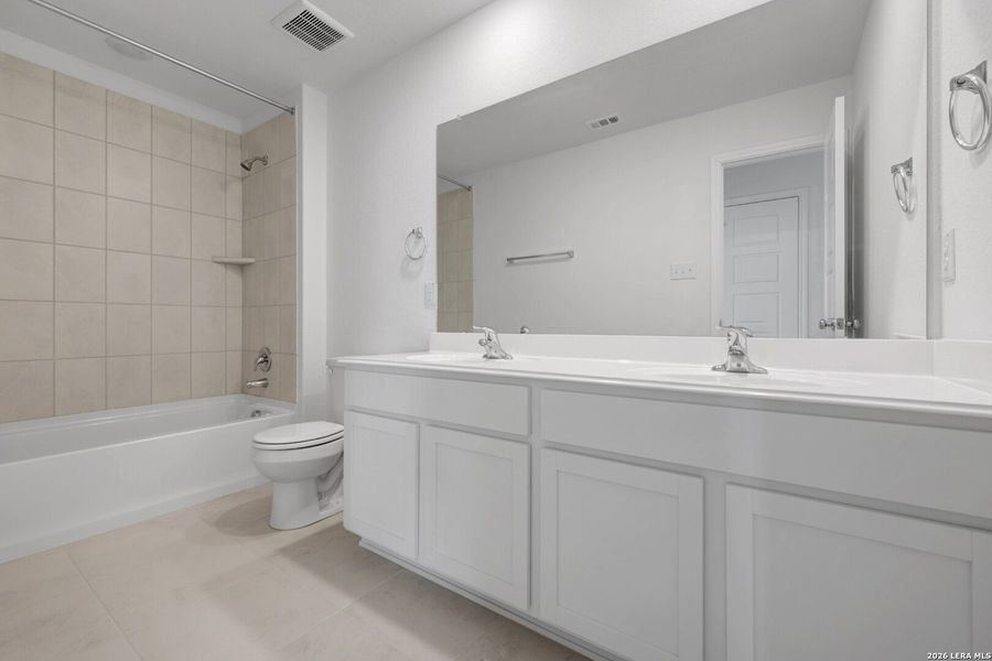 Furnished interior view inside a new home in Greenspoint Heights, Seguin (Image 10).