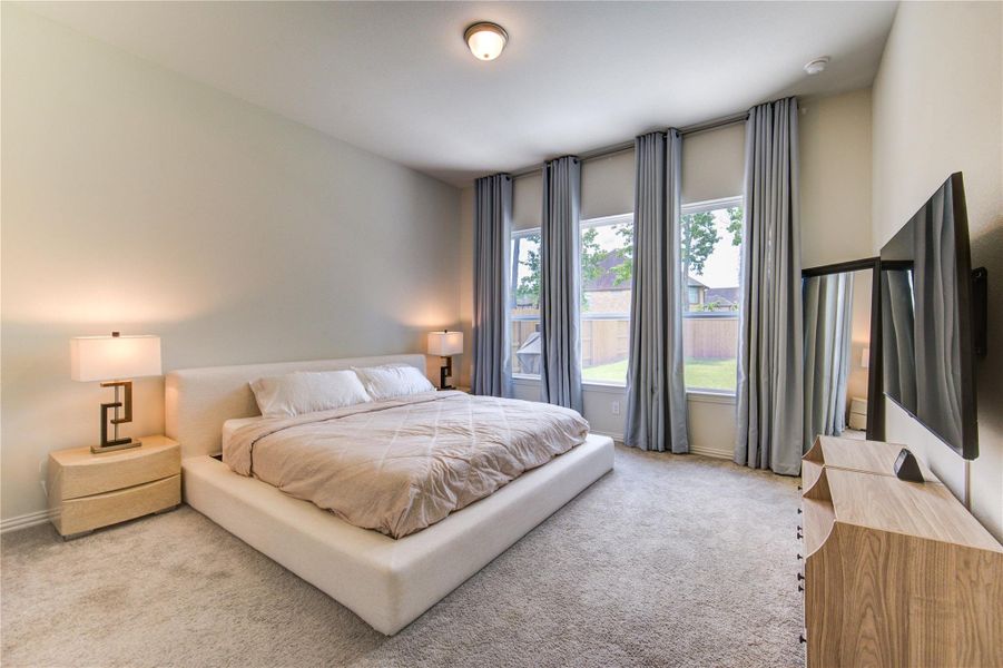 Primary Suite to relax and rejuvenate.