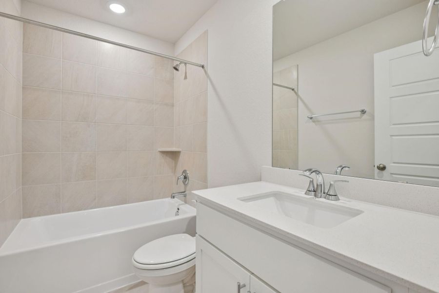 Furnished interior view inside a new home in Granger Pointe - Traditional Series, Conroe (Image 11).