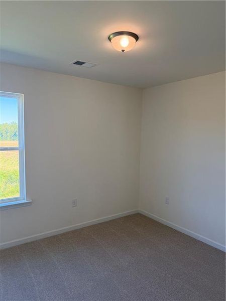 Spacious, unfurnished interior of a new home in The Brooke at Rivertown, South Fulton (Image 12).