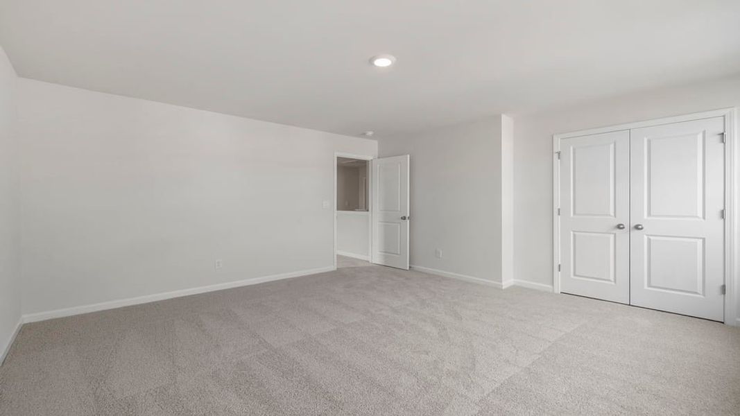 Spacious, unfurnished interior of a new home in Durbin Meadows Traditions, Fountain Inn (Image 28).