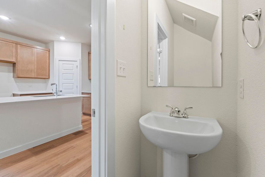 Half Bath in the Pearl home plan by Trophy Signature Homes – REPRESENTATIVE PHOTO Half Bath in the Pearl home plan by Trophy Signature Homes – REPRESENTATIVE PHOTO