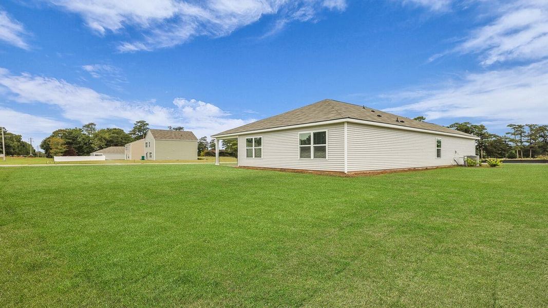 Exterior details and patio area of a home in Huggins Hill, Manning (Image 18).