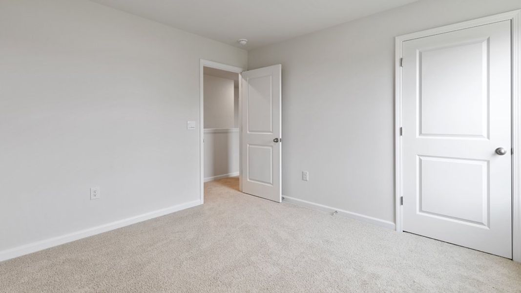 Spacious, unfurnished interior of a new home in Villa Grande, Winterville (Image 33).