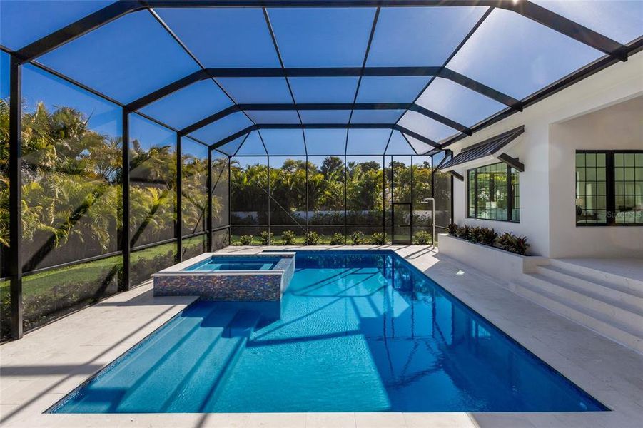 Exterior details and patio area of a home in , Sarasota (Image 29).