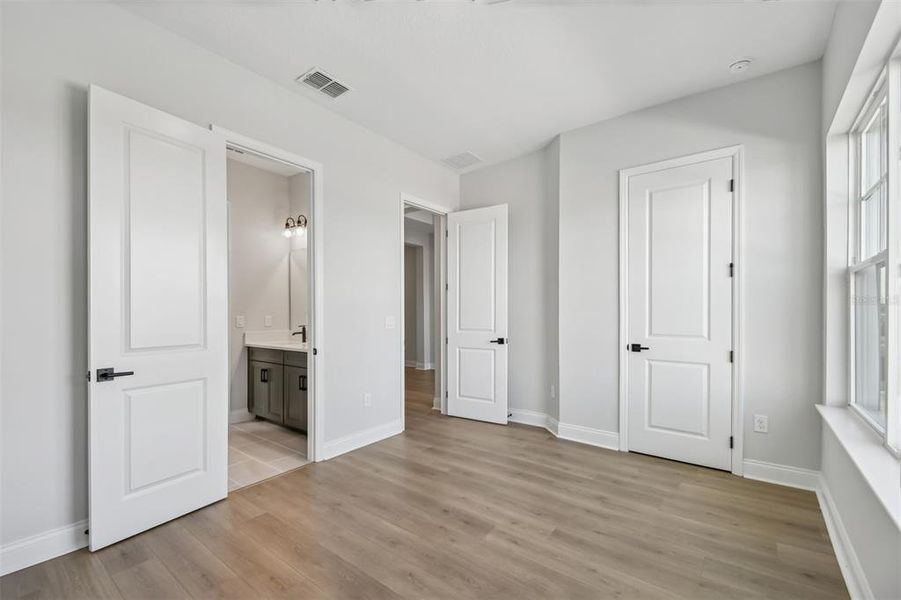 Spacious, unfurnished interior of a new home in Laureate Park at Lake Nona - Park Series, Orlando (Image 19).