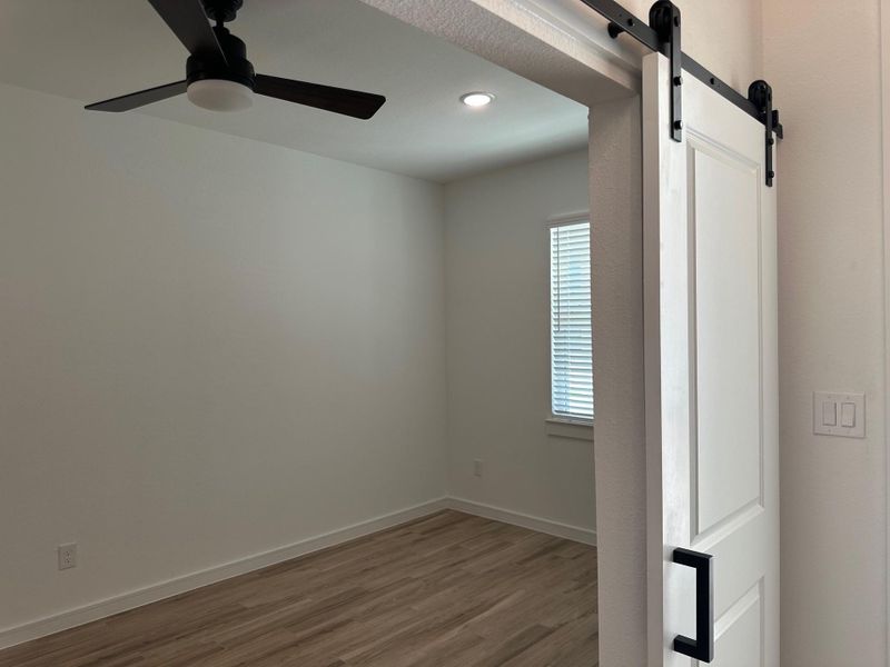 Convenient home office with barn doors Convenient home office with barn doors