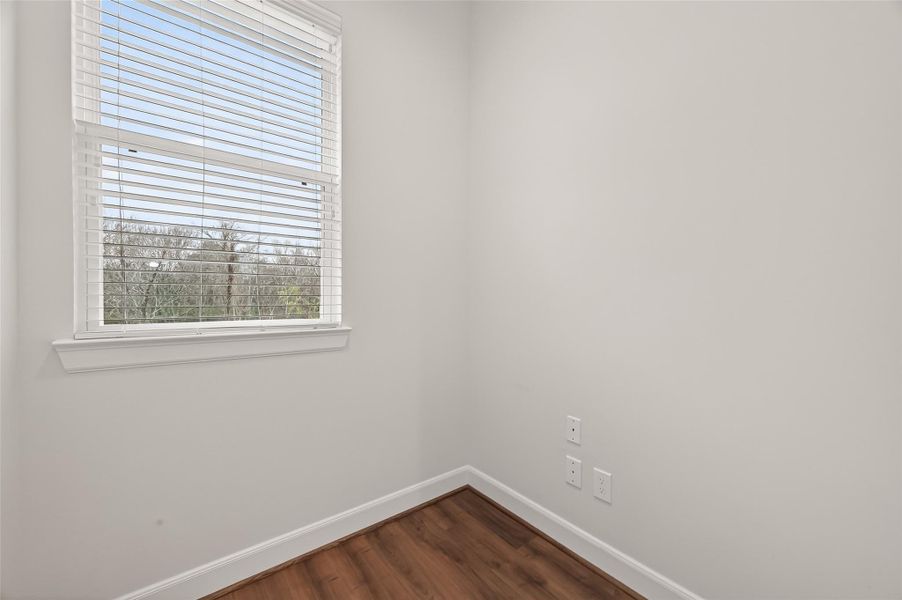Spacious, unfurnished interior of a new home in The Corner At Buffalo Pointe, Houston (Image 32).