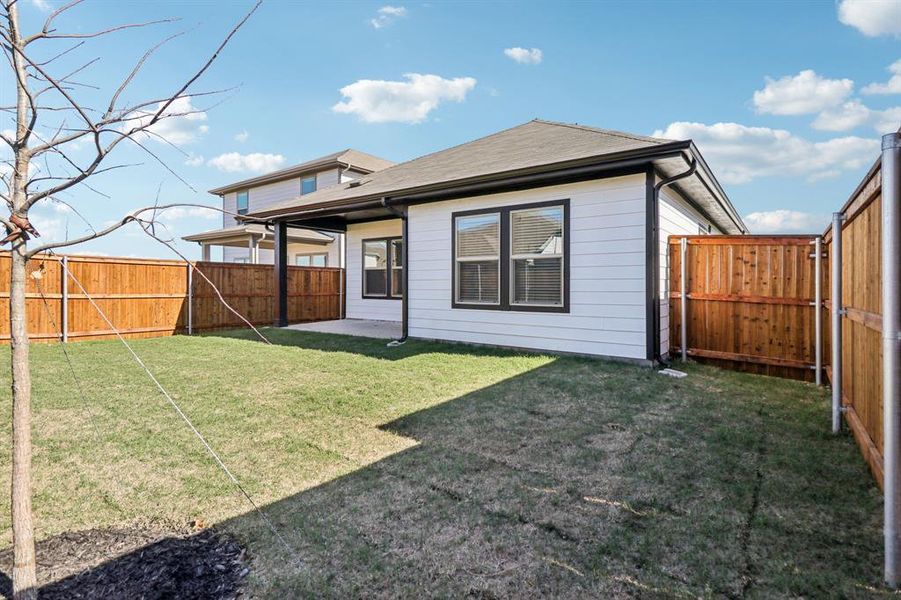Exterior details and patio area of a home in Lakehaven - Spring Series, Farmersville (Image 3).