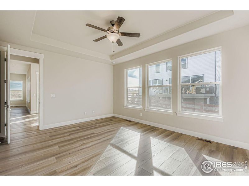 Spacious, unfurnished interior of a new home in RainDance National 60/70, Windsor (Image 26).