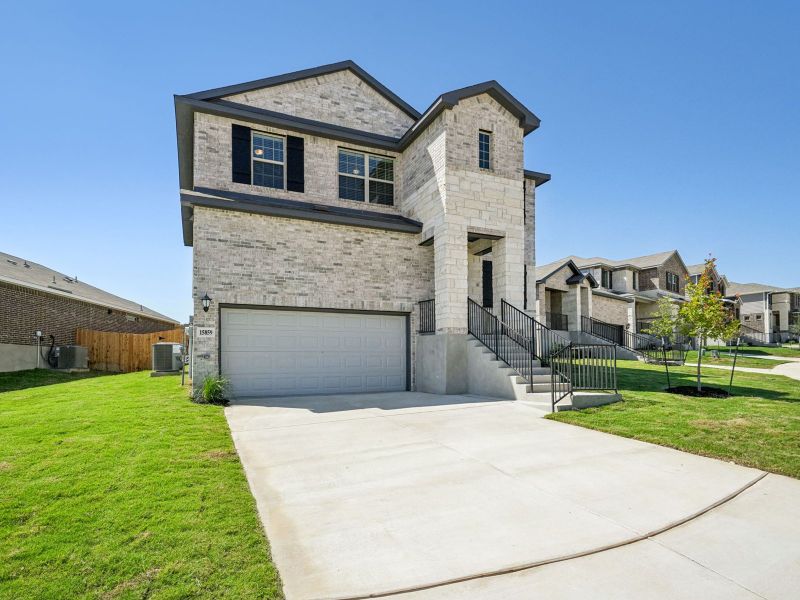 Front exterior of the Red River floorplan at a Meritage Homes community.