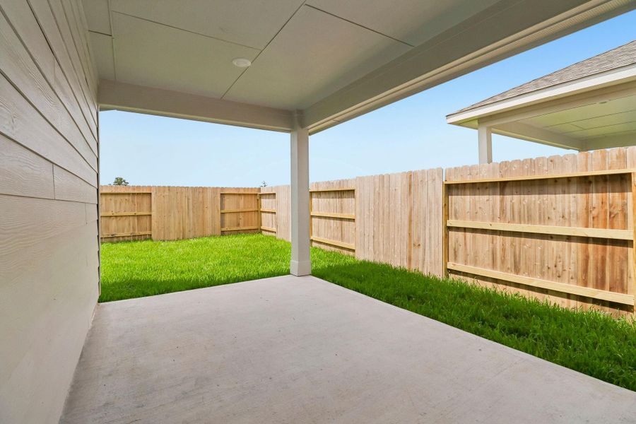 Exterior details and patio area of a home in Riviera Pines - Premier Series, Huffman (Image 21). Exterior details and patio area of a home in Riviera Pines - Premier Series, Huffman (Image 21).
