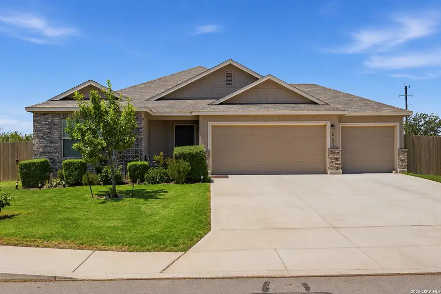 Front exterior of a new home in , Atascosa, TX, highlighting curb appeal (Image 20).