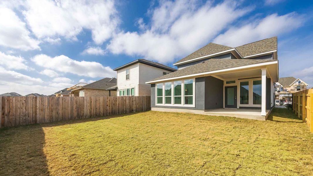 Exterior details and patio area of a home in Santa Rita Ranch - Tierra Rosa, Santa Rita Ranch (Image 3).