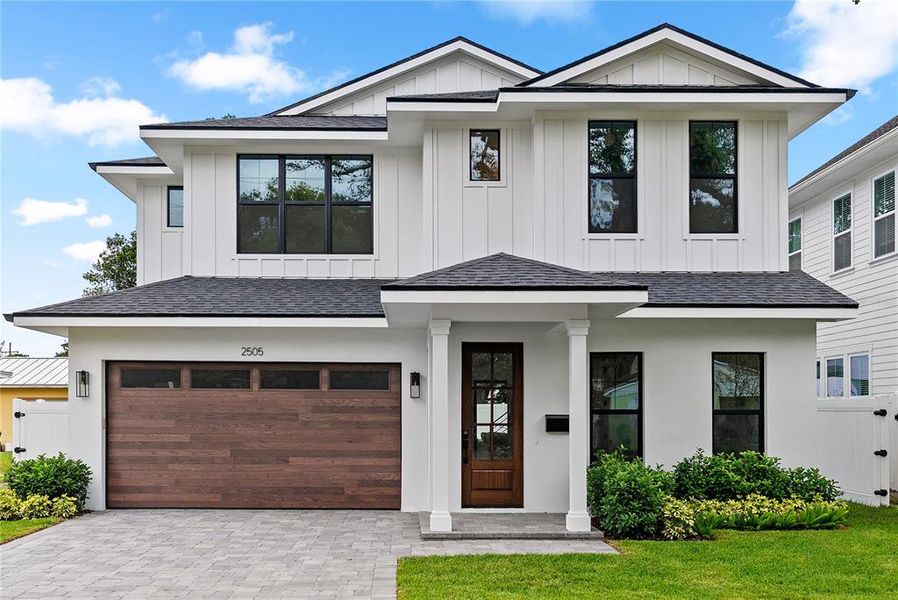 Front exterior of a new home in , Orlando, FL, highlighting curb appeal (Image 24). Front exterior of a new home in , Orlando, FL, highlighting curb appeal (Image 24).
