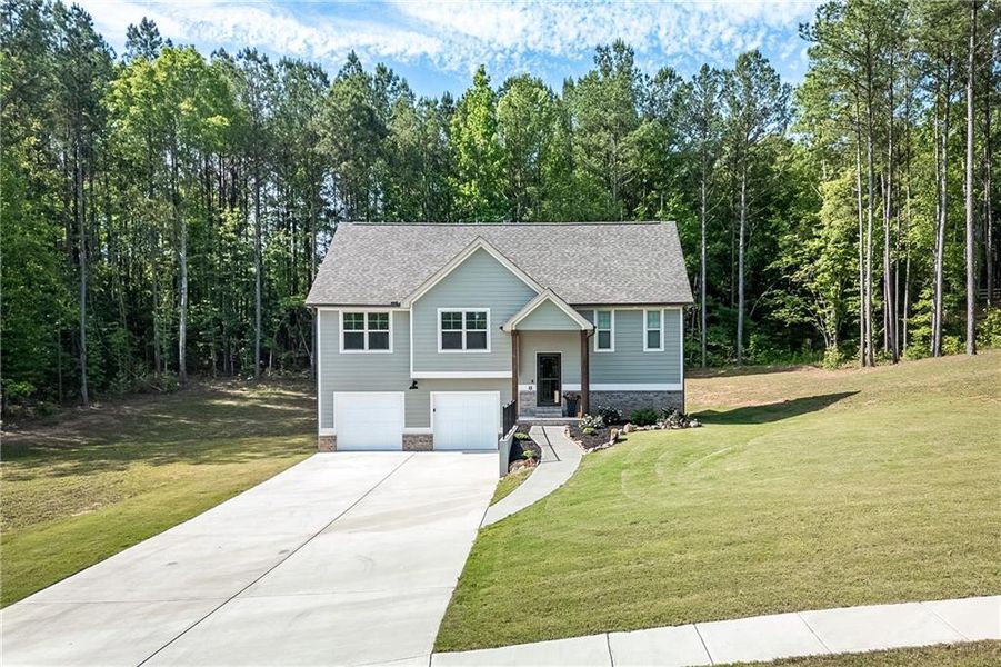 Front exterior of a new home in , Villa Rica, GA, highlighting curb appeal (Image 2). Front exterior of a new home in , Villa Rica, GA, highlighting curb appeal (Image 2).