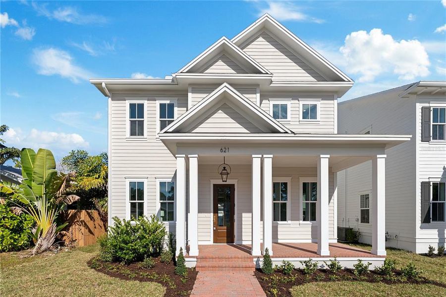 Front exterior of a new home in , St. Petersburg, FL, highlighting curb appeal (Image 1). Front exterior of a new home in , St. Petersburg, FL, highlighting curb appeal (Image 1).