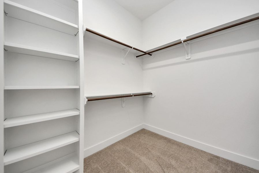 Additional view of primary closet.