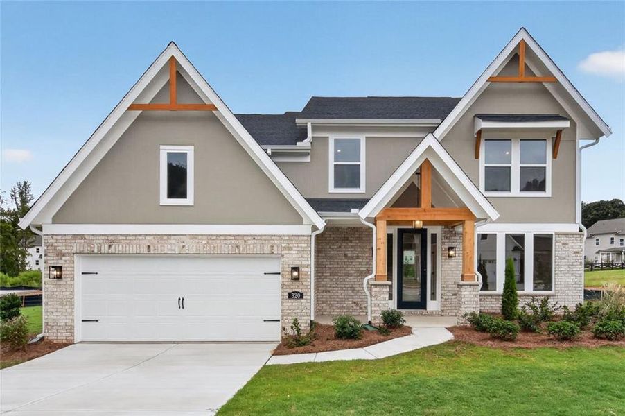 Front exterior of a new home in Hidden Fields, Hoschton, GA, highlighting curb appeal (Image 19). Front exterior of a new home in Hidden Fields, Hoschton, GA, highlighting curb appeal (Image 19).