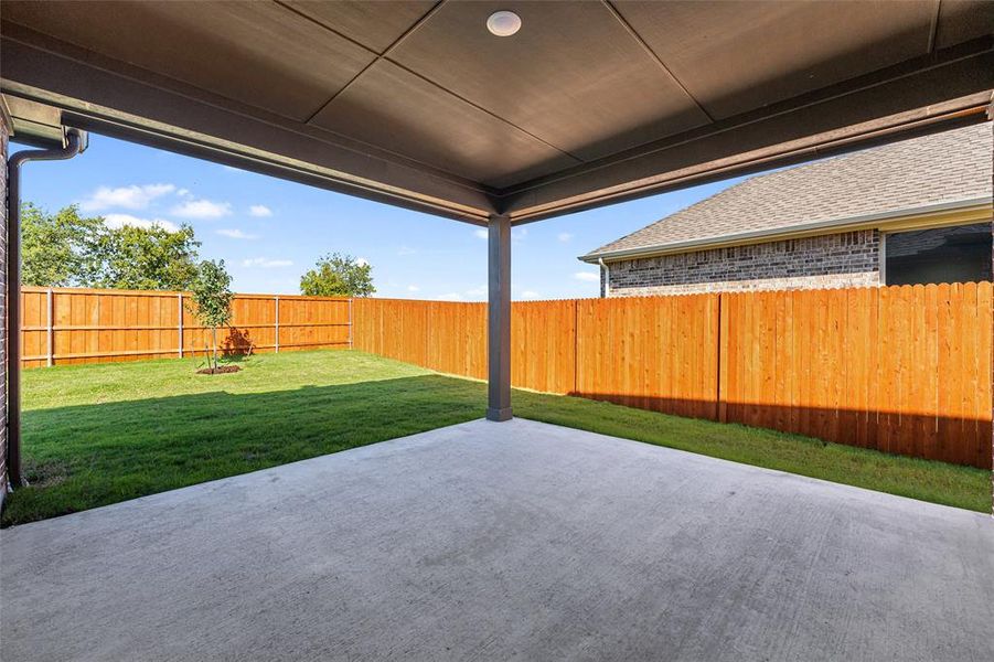 Exterior details and patio area of a home in Morningstar, Aledo (Image 20).