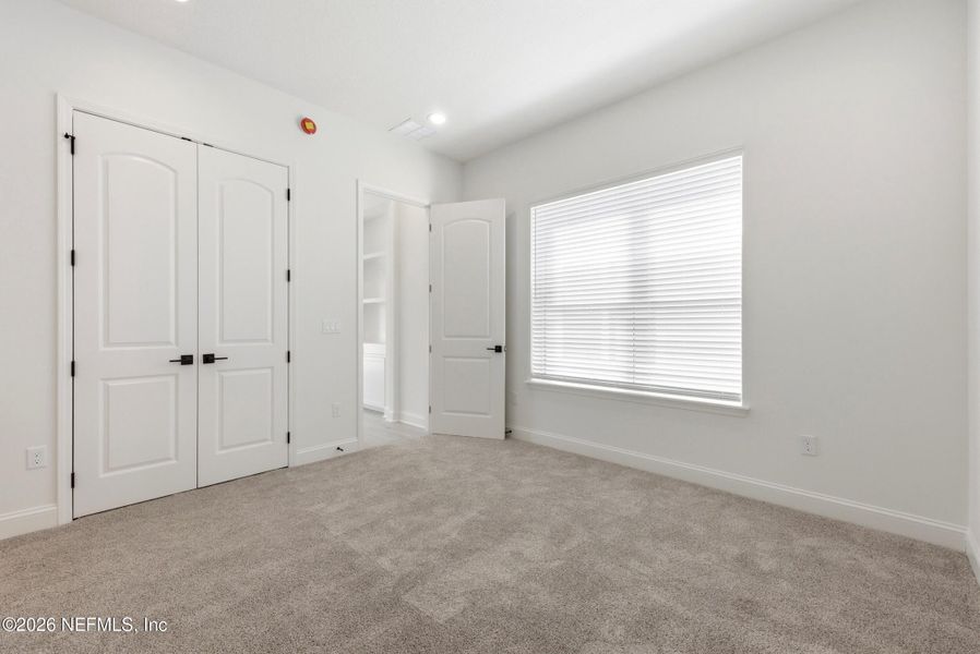Spacious, unfurnished interior of a new home in Silver Landing At Silverleaf, St. Augustine (Image 23).