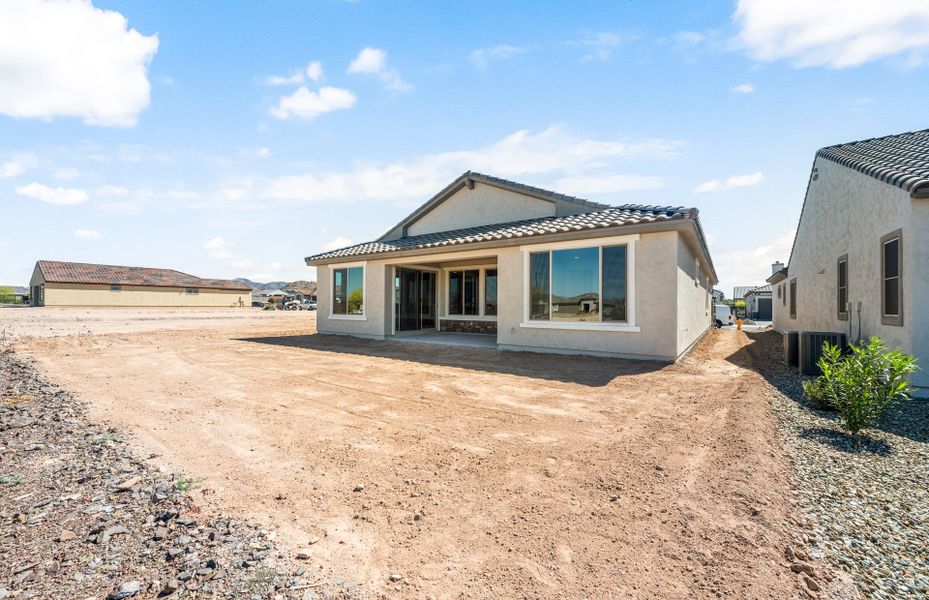 Exterior details and patio area of a home in Sun City Festival, Buckeye (Image 3).