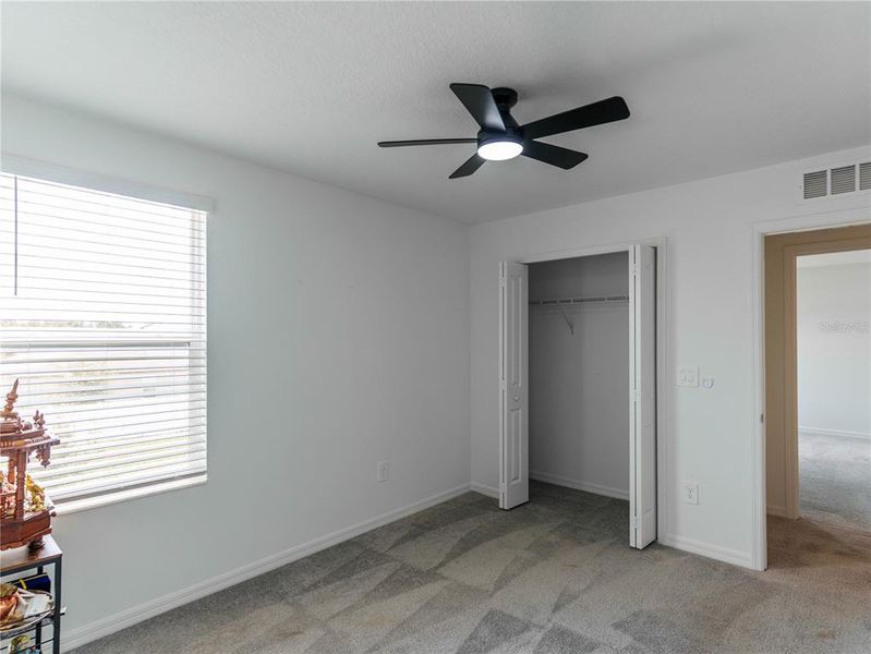 Spacious, unfurnished interior of a new home in The Isle of Avalon, Spring Hill (Image 33).