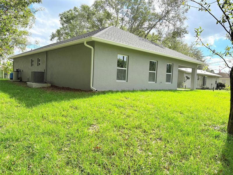 Front exterior of a new home in , Okeechobee, FL, highlighting curb appeal (Image 27).
