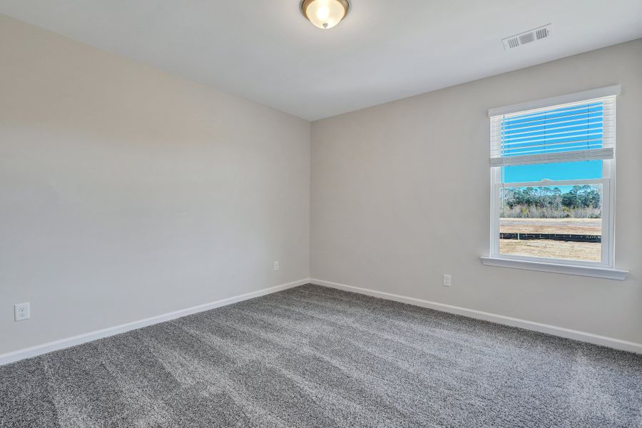 Representative unfurnished interior of a home built from the The Cypress by Smith Family Homes in Heritage at New Riverside, Bluffton (Image 27).