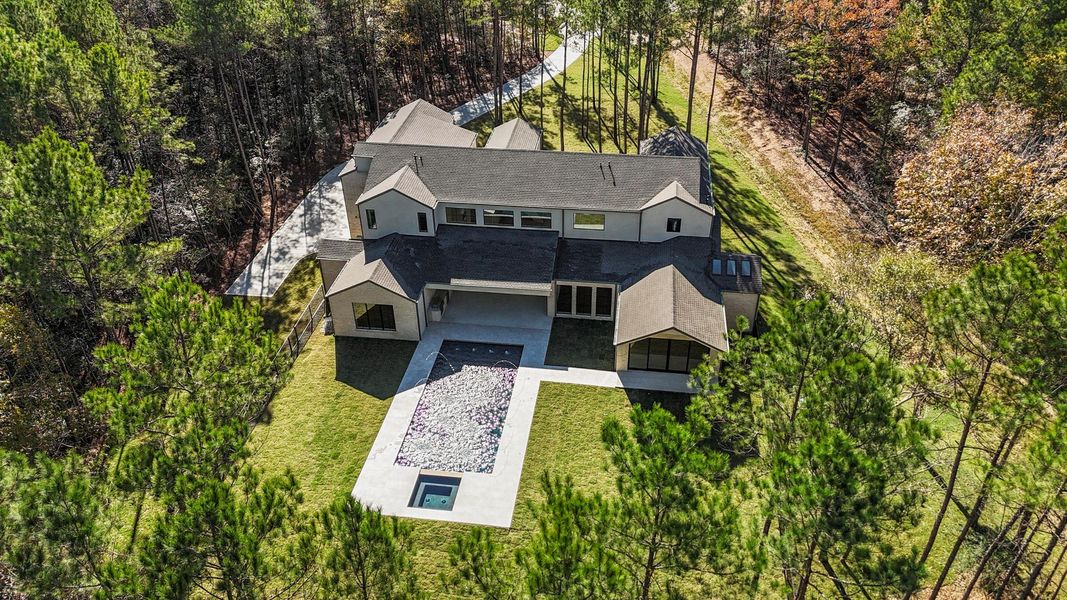 Front exterior of a new home in , Montgomery, TX, highlighting curb appeal (Image 25). Front exterior of a new home in , Montgomery, TX, highlighting curb appeal (Image 25).