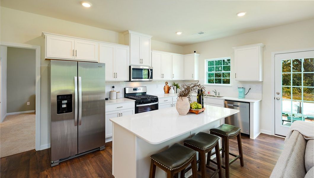 Furnished interior view inside a new home in Tap Root Farms, Fletcher (Image 7).