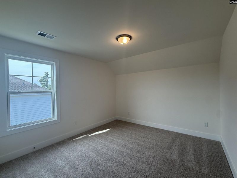 Spacious, unfurnished interior of a new home in Cottages at Roofs Pond, West Columbia (Image 33).