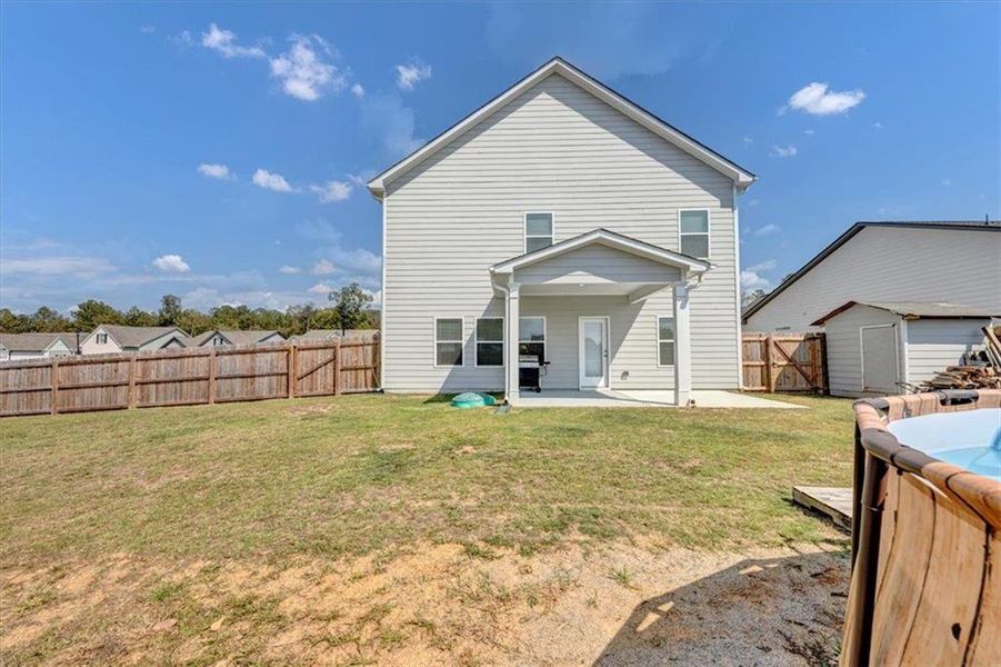 Front exterior of a new home in , Rome, GA, highlighting curb appeal (Image 25). Front exterior of a new home in , Rome, GA, highlighting curb appeal (Image 25).