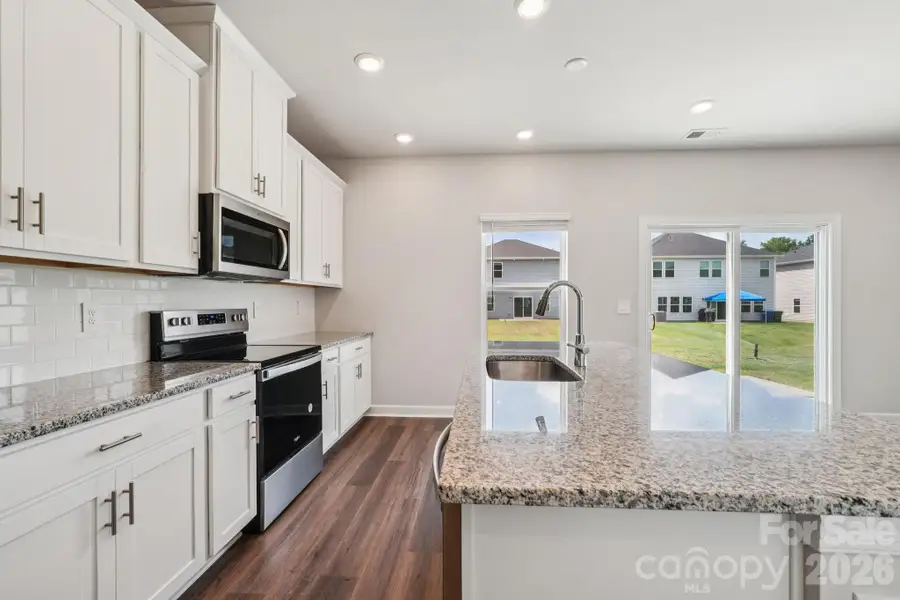 Photo is not of the actual home, but is an inspirational photo of builder’s model home and may depict options, furnishings, and/or decorator features that are not included