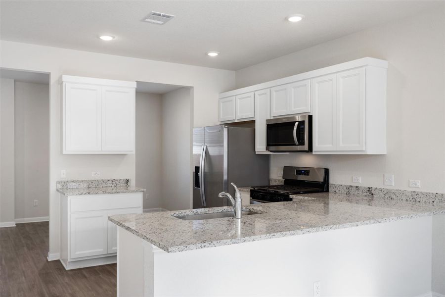 Furnished interior view inside a new home in Avery Centre, Round Rock (Image 9).