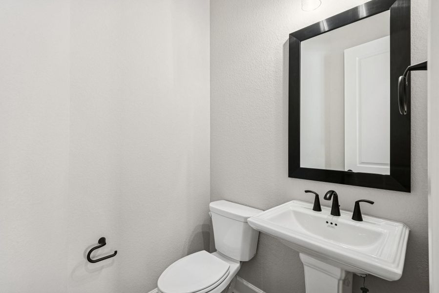 Furnished interior view inside a new home in ARTAVIA 65' Homesites, Conroe (Image 9).